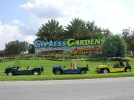 International Moke Day in Cypress Gardens Florida. Parked in front of the sign